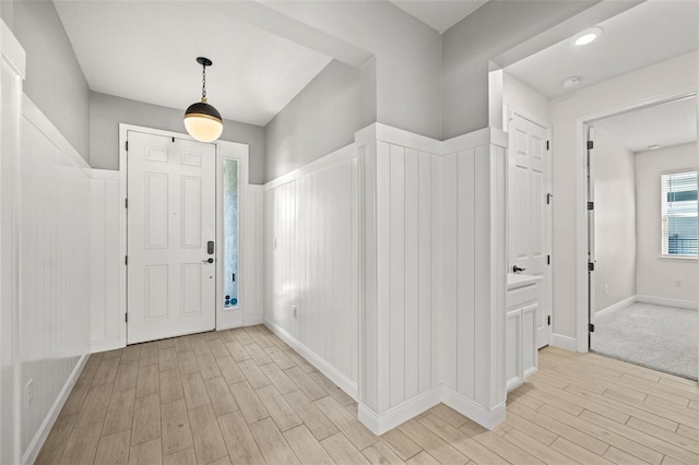 entryway with light hardwood / wood-style flooring