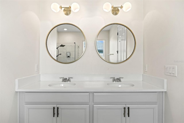 bathroom with a shower and vanity