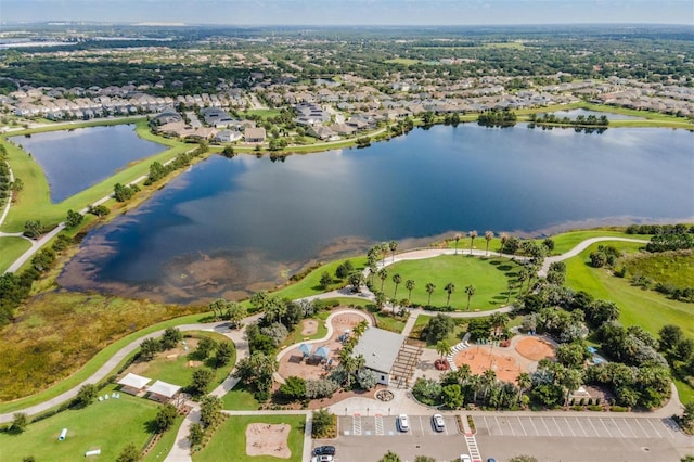 birds eye view of property featuring a water view