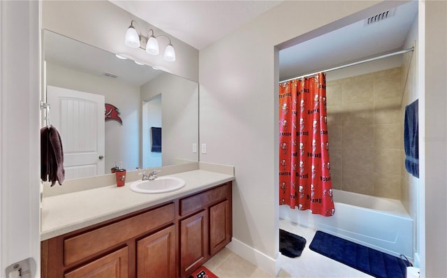 bathroom with tile patterned flooring, shower / tub combo with curtain, and vanity