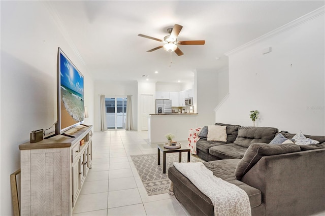 tiled living room with crown molding and ceiling fan