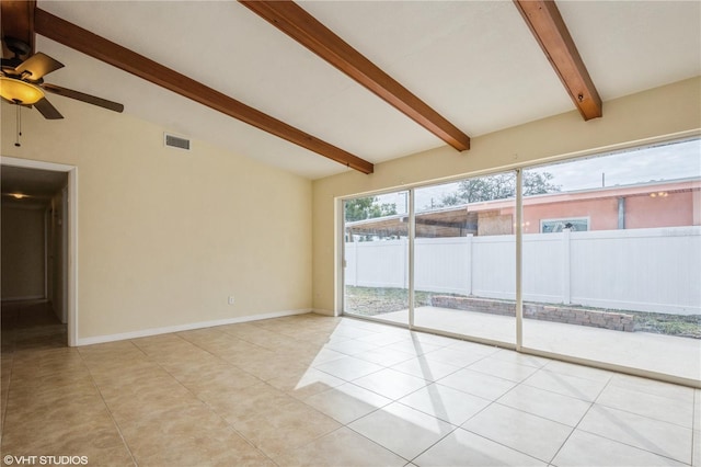 unfurnished room featuring ceiling fan, light tile patterned flooring, and lofted ceiling with beams