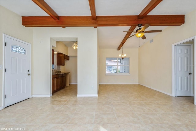 unfurnished living room featuring beamed ceiling, light tile patterned flooring, and ceiling fan with notable chandelier