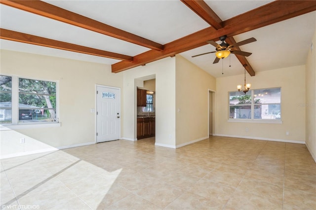 interior space featuring light tile patterned floors, beamed ceiling, and ceiling fan with notable chandelier