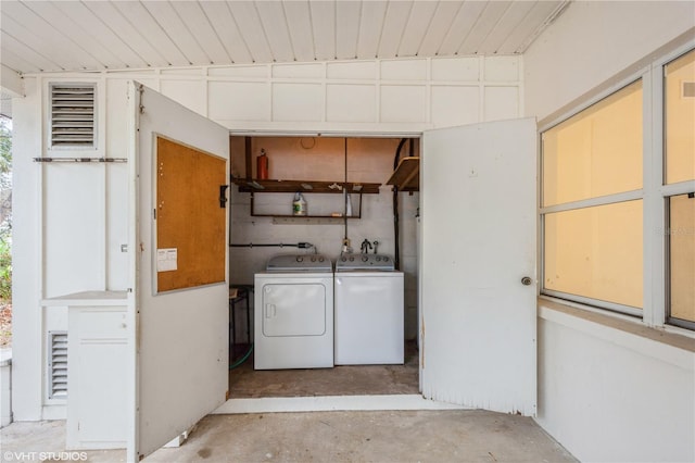 washroom featuring separate washer and dryer