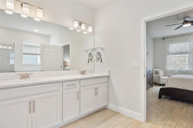 bathroom with vanity and ceiling fan