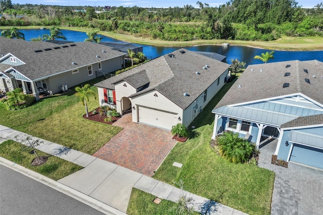 drone / aerial view with a water view