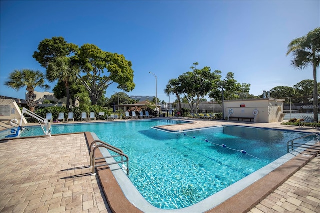 view of pool featuring a patio