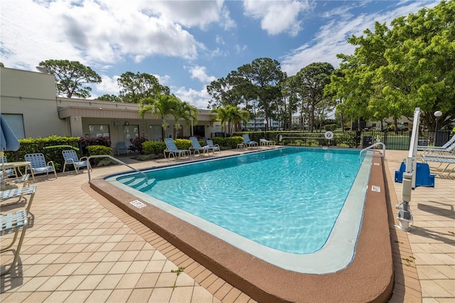 8174 Terrace Garden Dr N Unit 110, Saint Petersburg, FL 33709 - community pool with a patio