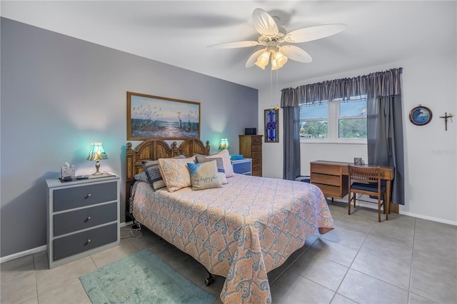 8174 Terrace Garden Dr N Unit 110, Saint Petersburg, FL 33709 - bedroom featuring tile patterned floors and a ceiling fan