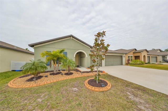 view of front facade featuring a front yard and a garage