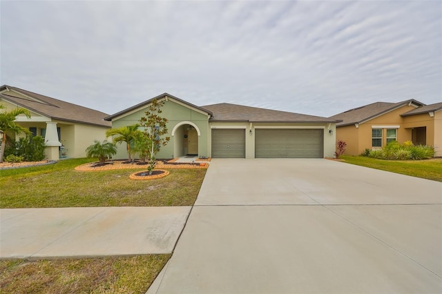 single story home featuring a garage and a front yard