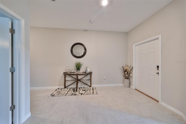 view of tiled entrance foyer