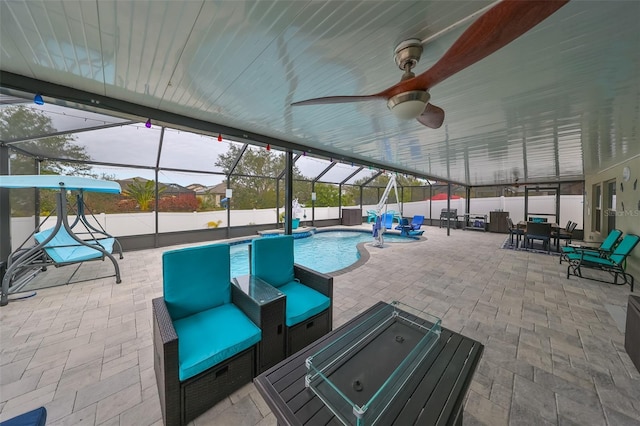 view of patio / terrace with a fenced in pool, an outdoor hangout area, pool water feature, ceiling fan, and a lanai