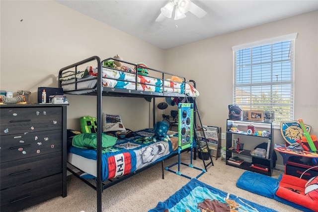 bedroom featuring carpet and ceiling fan