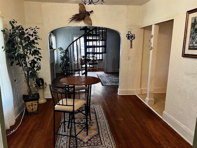 corridor with dark wood-type flooring