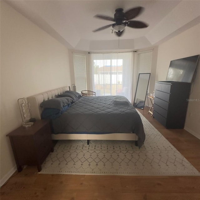 bedroom featuring ceiling fan and hardwood / wood-style floors