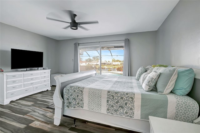 bedroom featuring ceiling fan and dark hardwood / wood-style flooring