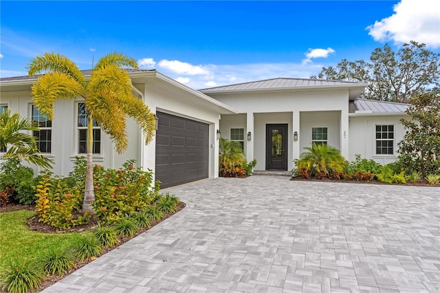 view of front of home featuring a garage