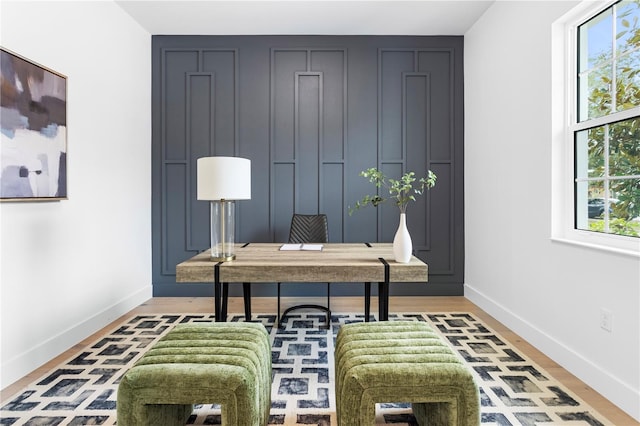 home office featuring hardwood / wood-style floors