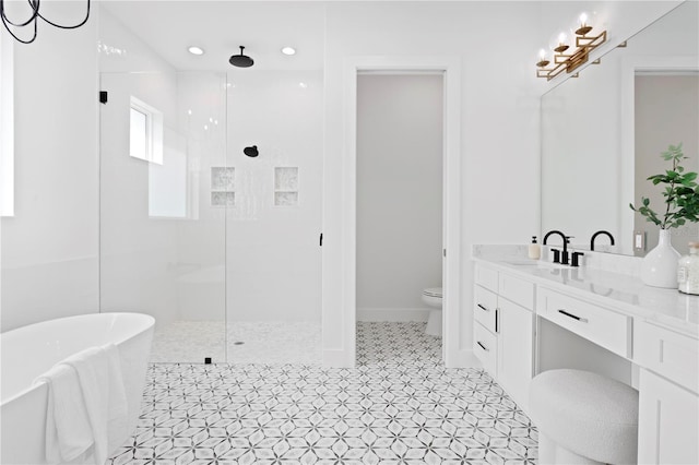 full bathroom featuring tile patterned flooring, toilet, vanity, and shower with separate bathtub