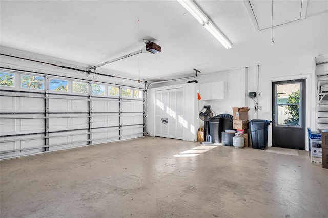 garage featuring a garage door opener