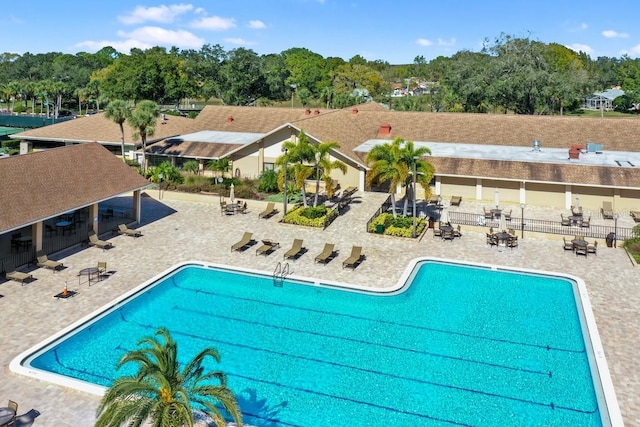 view of swimming pool with a patio