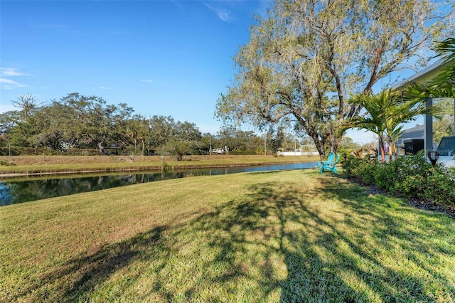 view of yard with a water view