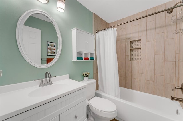 full bathroom featuring vanity, toilet, and shower / tub combo