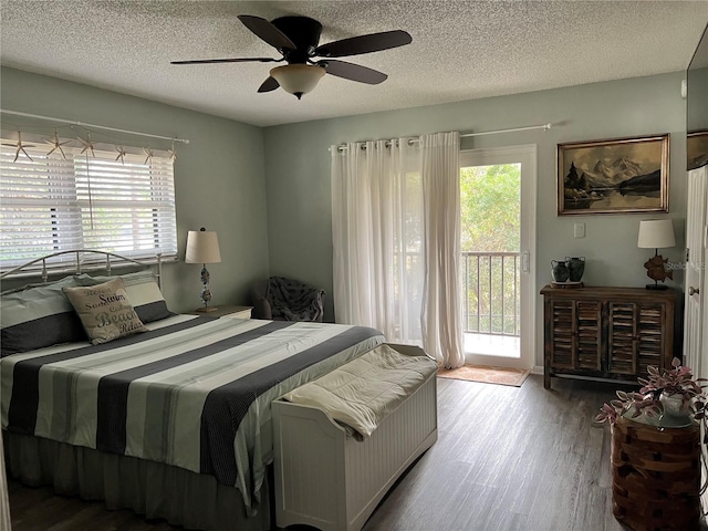 bedroom with access to exterior, ceiling fan, light hardwood / wood-style floors, and multiple windows