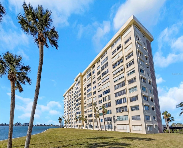 view of building exterior with a water view