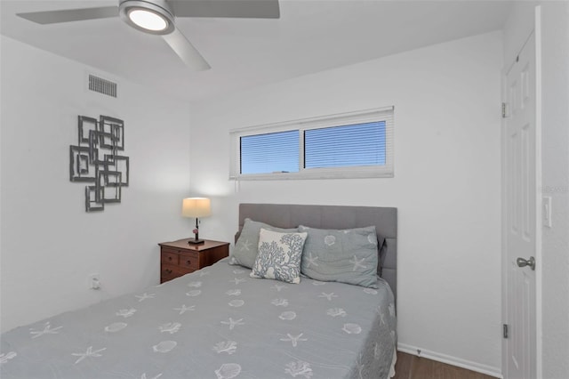 bedroom featuring ceiling fan and hardwood / wood-style flooring