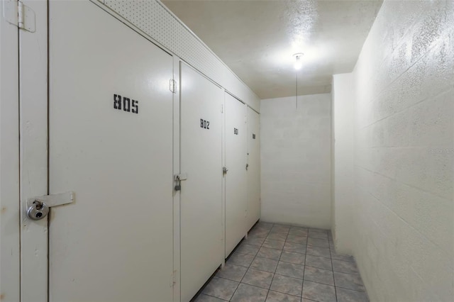 hallway featuring light tile patterned floors