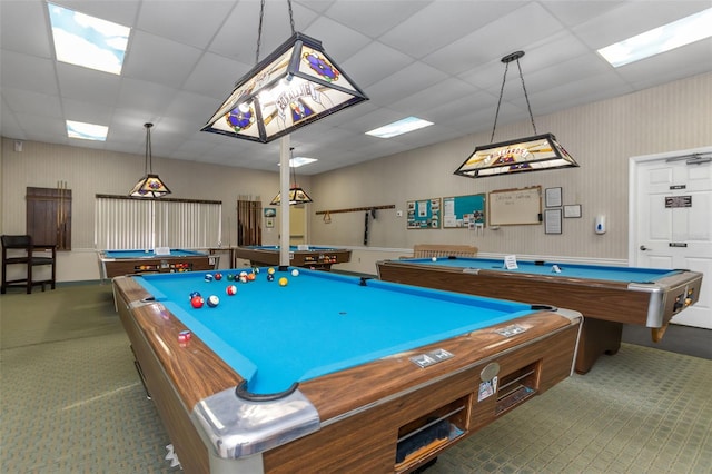 playroom with a paneled ceiling and billiards