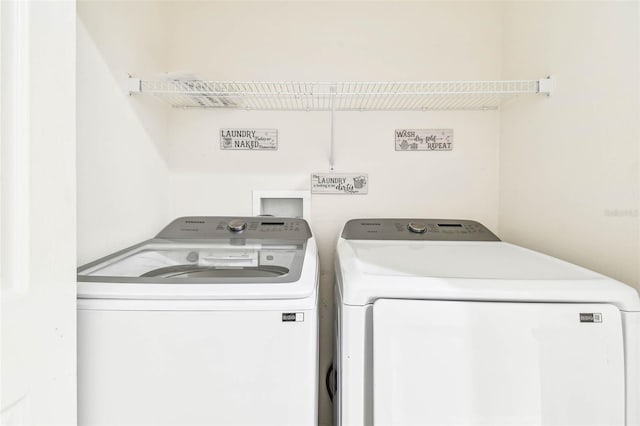 laundry room featuring washer and clothes dryer