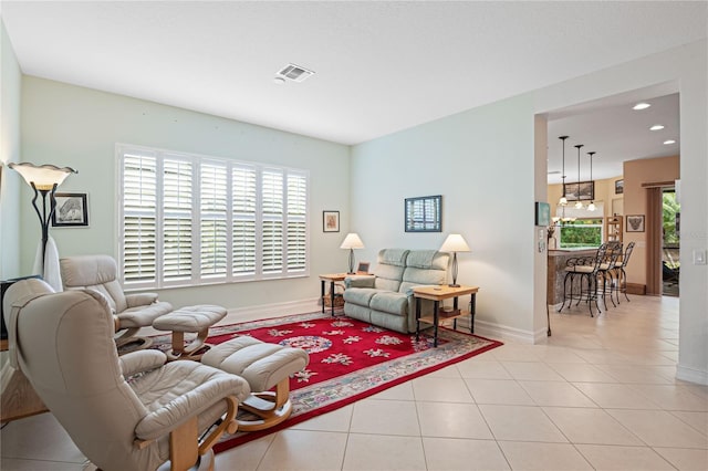 living room featuring light tile patterned flooring