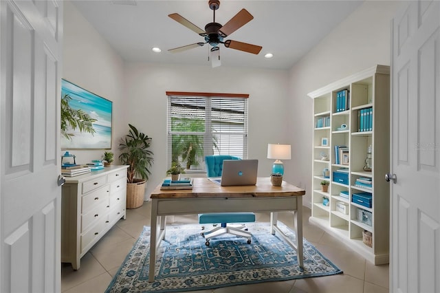 office space featuring light tile patterned flooring, ceiling fan, and recessed lighting