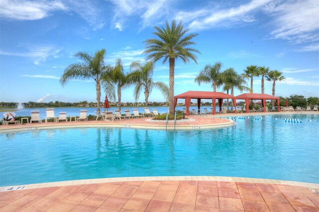 community pool with a gazebo