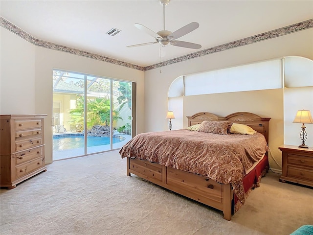 bedroom with access to exterior, light carpet, and ceiling fan