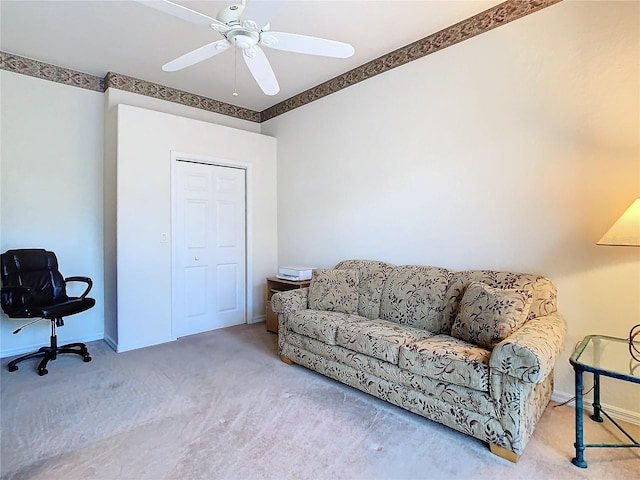 interior space featuring carpet and ceiling fan