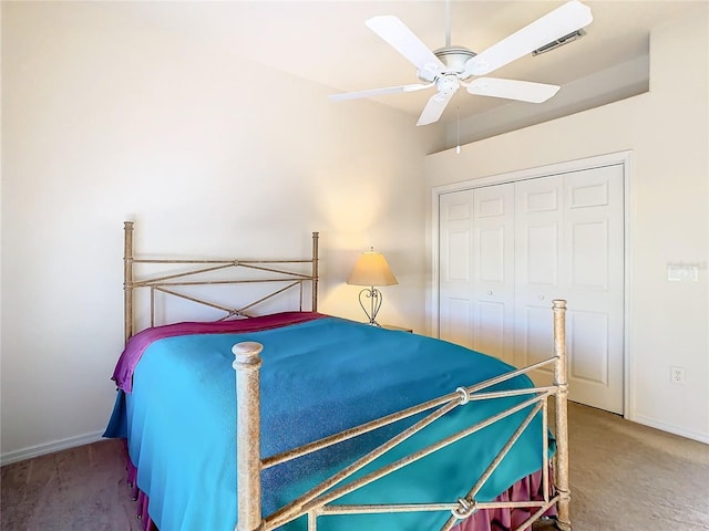 unfurnished bedroom featuring a closet, baseboards, ceiling fan, and carpet floors