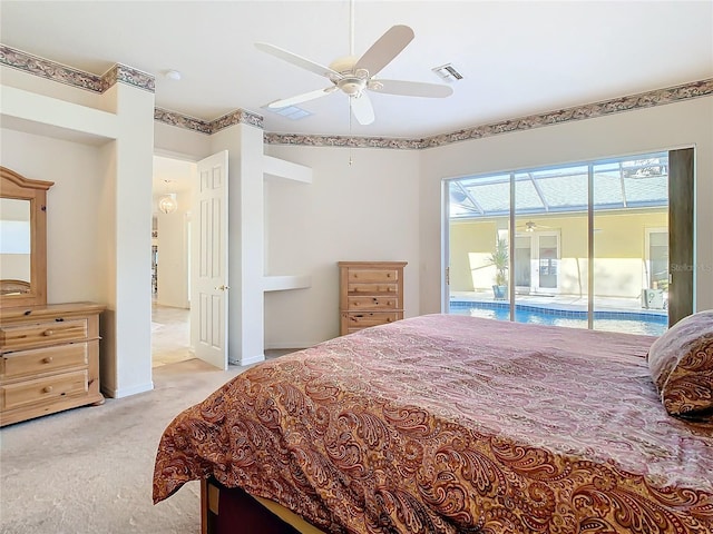 bedroom featuring access to exterior, a ceiling fan, visible vents, and light carpet