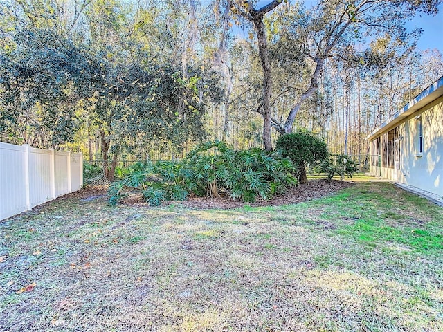 view of yard with fence