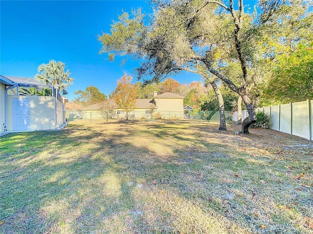 view of yard featuring a fenced backyard