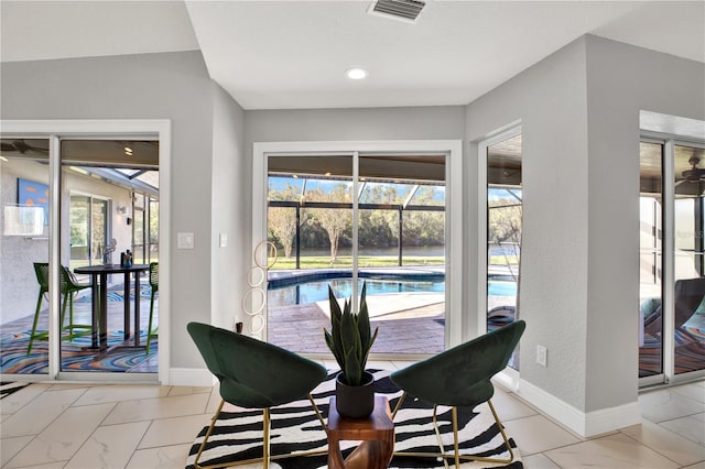 dining room with plenty of natural light