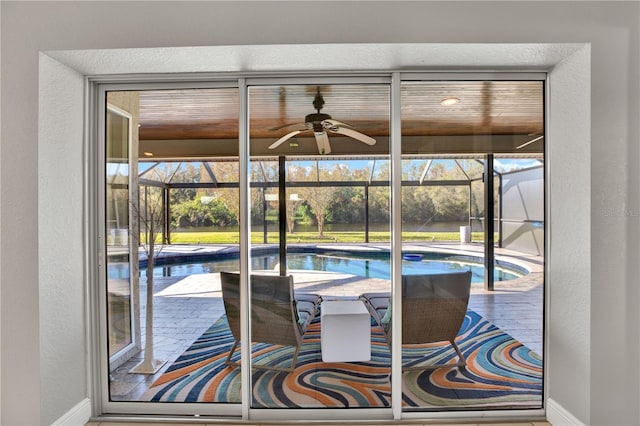 view of pool with ceiling fan