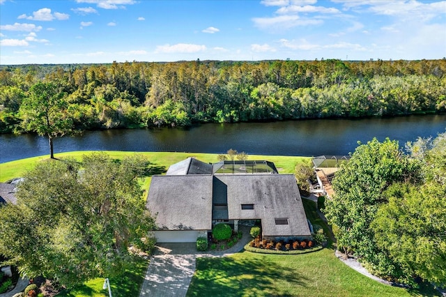 birds eye view of property with a water view