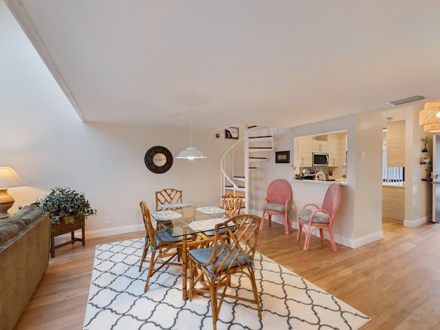 dining room featuring light hardwood / wood-style floors