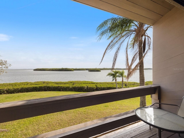 balcony featuring a water view