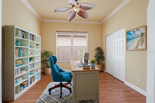 office space with hardwood / wood-style flooring, ceiling fan, and crown molding